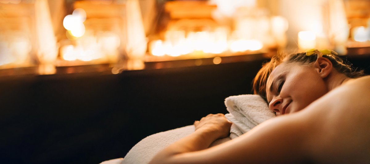 Woman relaxing during professional massage therapy session in Frisco TX